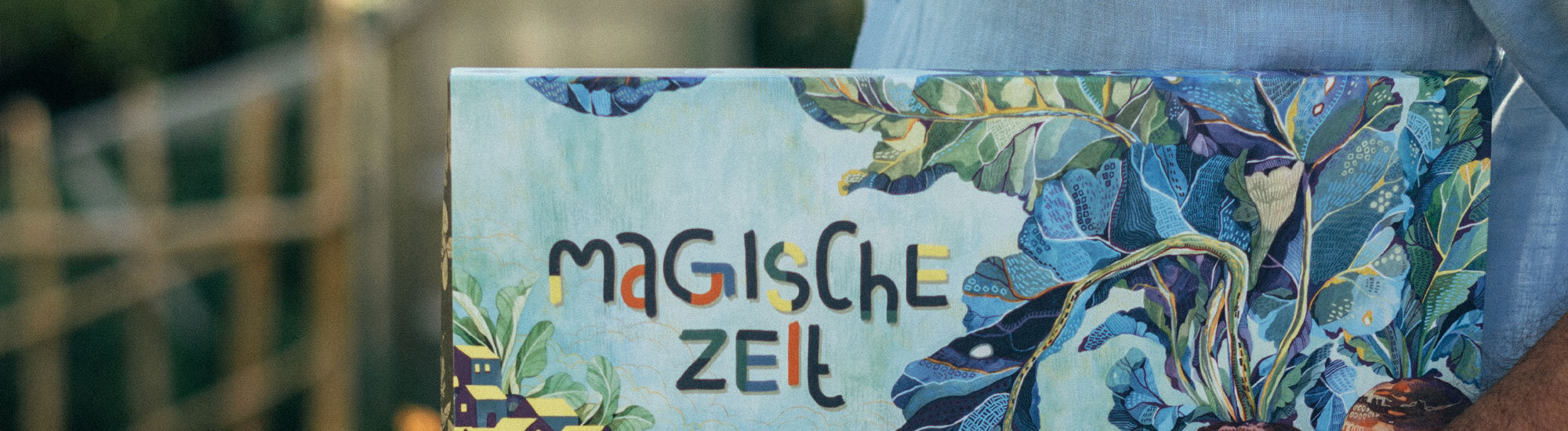 Schachtel des Bio-Saatgut-Adventskalenders „Magische Zeit“ Bunter Selbstversorgergarten im Ausschnitt
